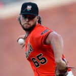 Major League Baseball warns San Francisco Giants players for writing Bible verses on Pride Night hats