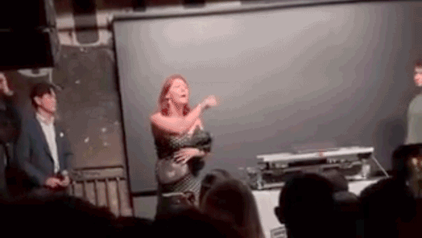 Protester storms DC party, flips off crowd as USA! chants erupt amid Trumps AI push