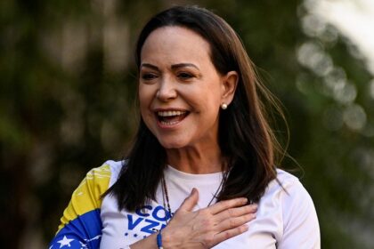 Venezuelan opposition leader MarÃ­a Corina Machado makes surprise return home after nearly a year abroad